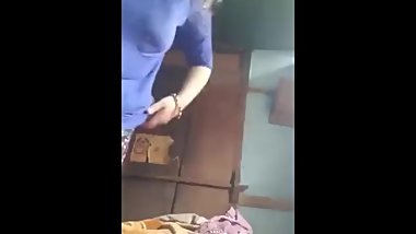 Nepali chick masturbate s while her family are outside.