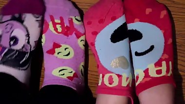 Two Girls Trying On Socks