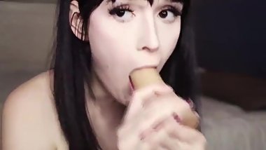 Cute brunette masturabtes anal with long dildo